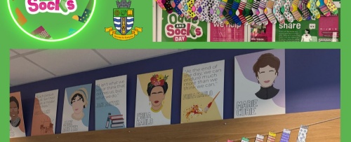 photograph of paper socks strung up on display at reception